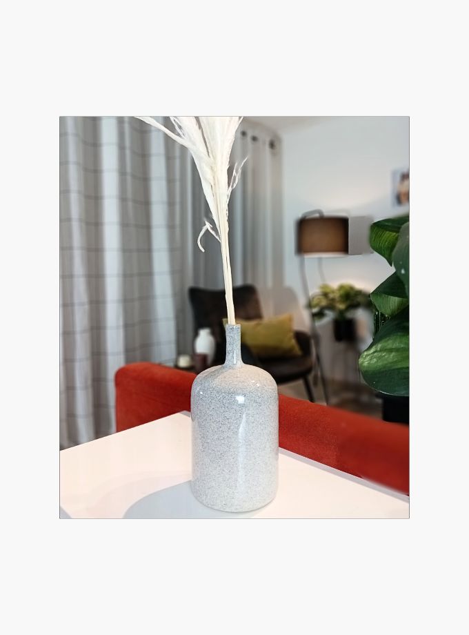 Ceramic bottle vase with pampas