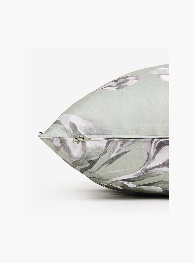 Teal and white floral print cushion (50cm x 50cm)