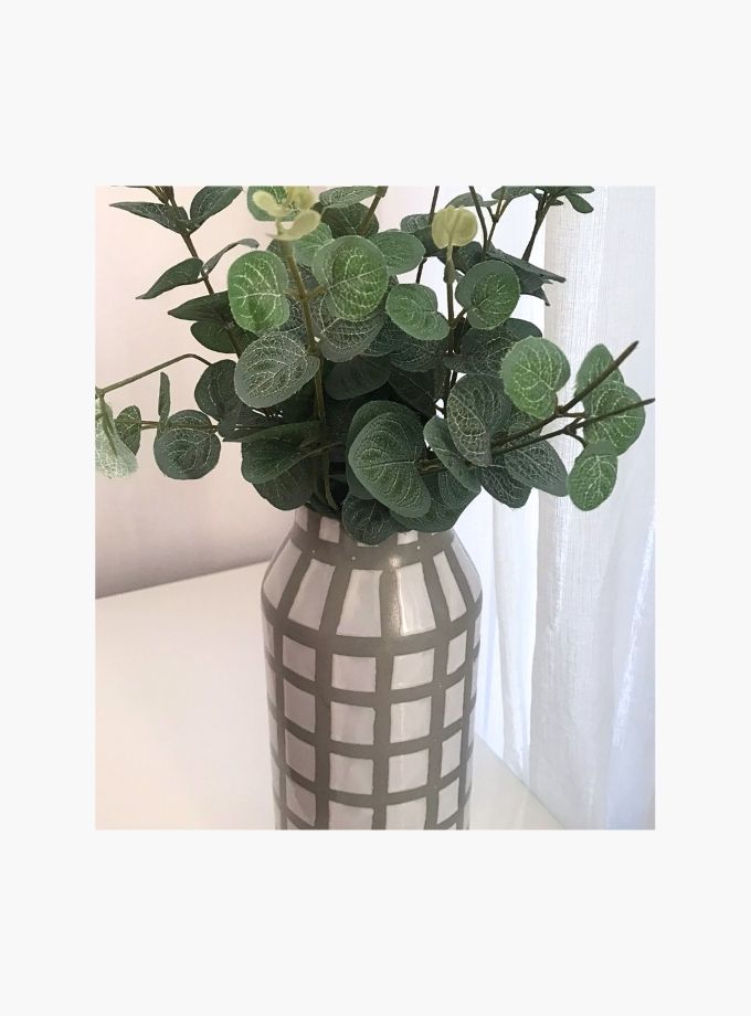 White and green striped ceramic vase