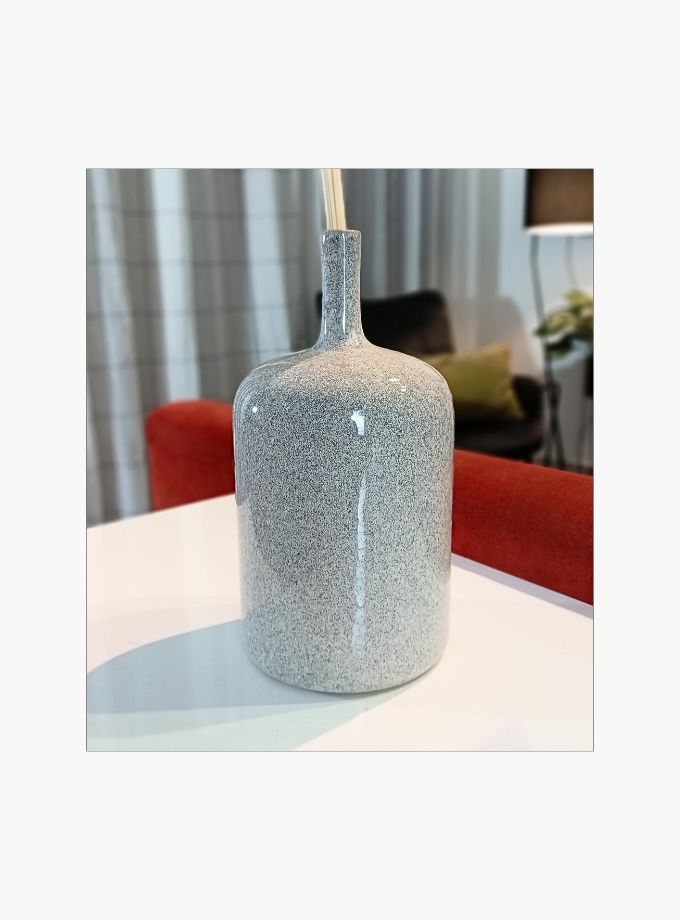 Ceramic bottle vase with pampas